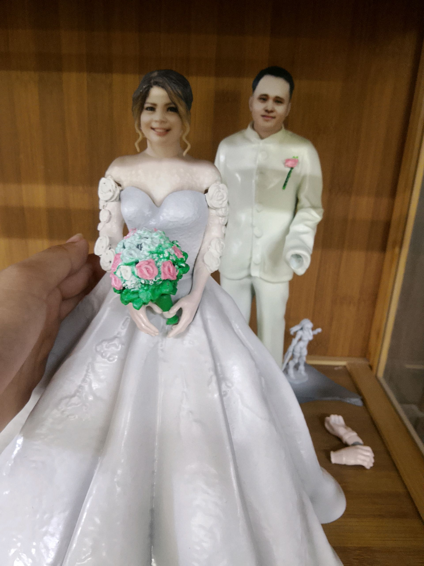 Full-color 3D printed wedding couple figurines, bride in a gown holding a bouquet